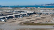 Two killed as cargo plane skids off Hong Kong runway into sea