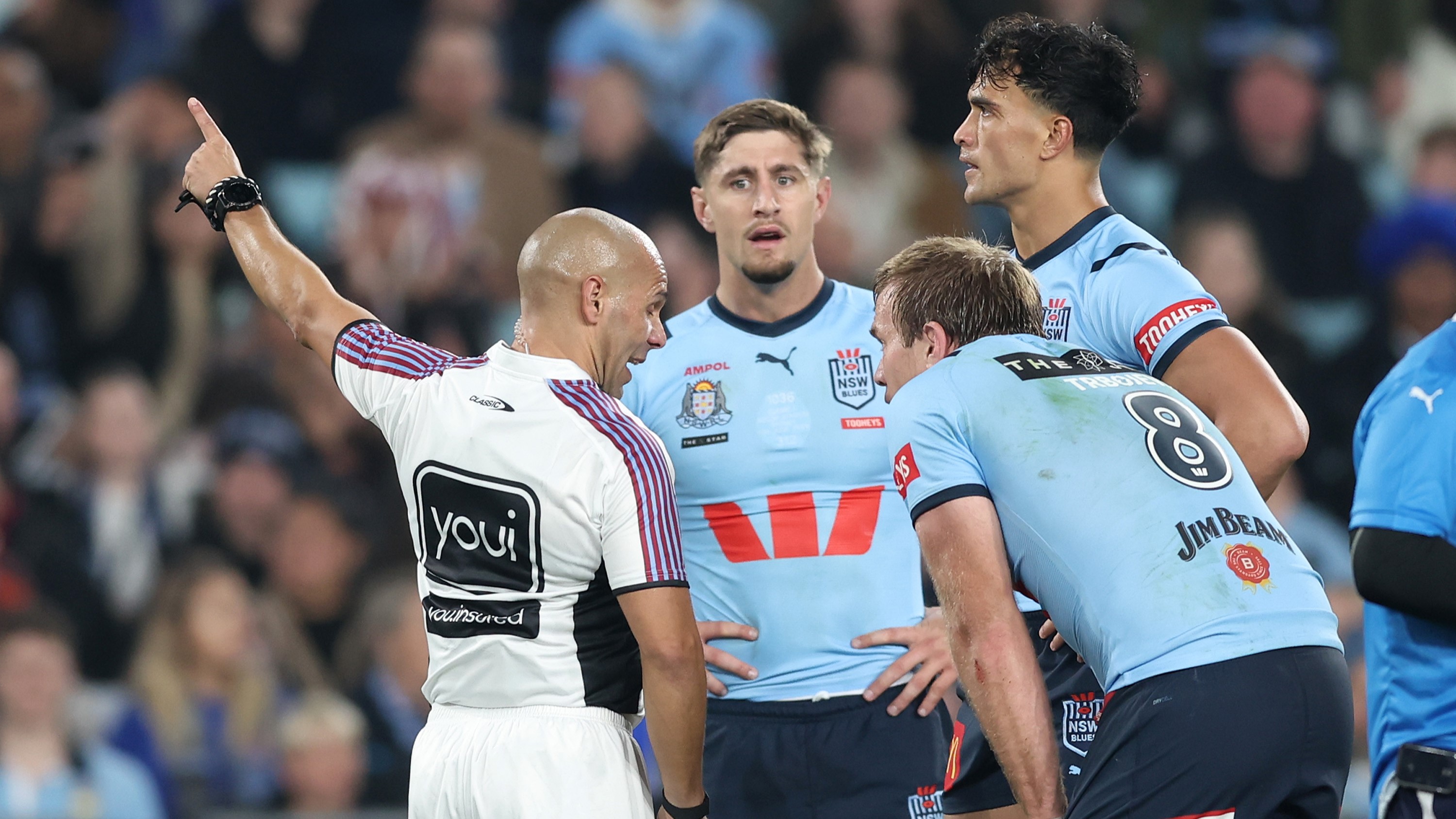 Joseph-Aukuso Sua'ali'i of the Blues is sent from the field by referee Ashley Klein for his dangerous tackle on Reece Walsh of the Maroons. Photo / Getty