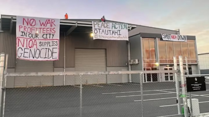 Protest banners in Rolleston. Photo / Supplied/peace.action.otautahi
