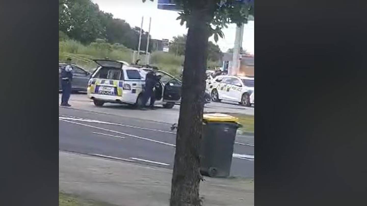 Armed police at the Gull petrol station on Porchester Rd, Takanini this morning. Photo / Supplied