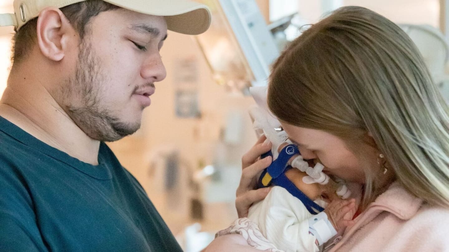 Reece Neho and Octaviah Jackson with their daughter Sophie Neho, who was born extremely premature.