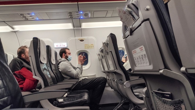 People coming to China will still need a negative virus test 48 hours before departure and passengers will be required to wear protective masks on board. Photo / NurPhoto