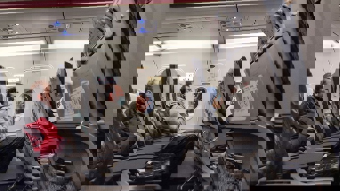 People coming to China will still need a negative virus test 48 hours before departure and passengers will be required to wear protective masks on board. Photo / NurPhoto