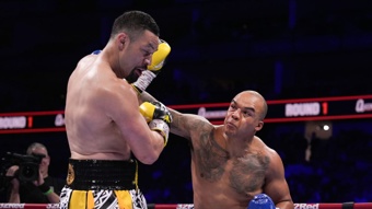 Parker's world title hopes crushed in late TKO loss