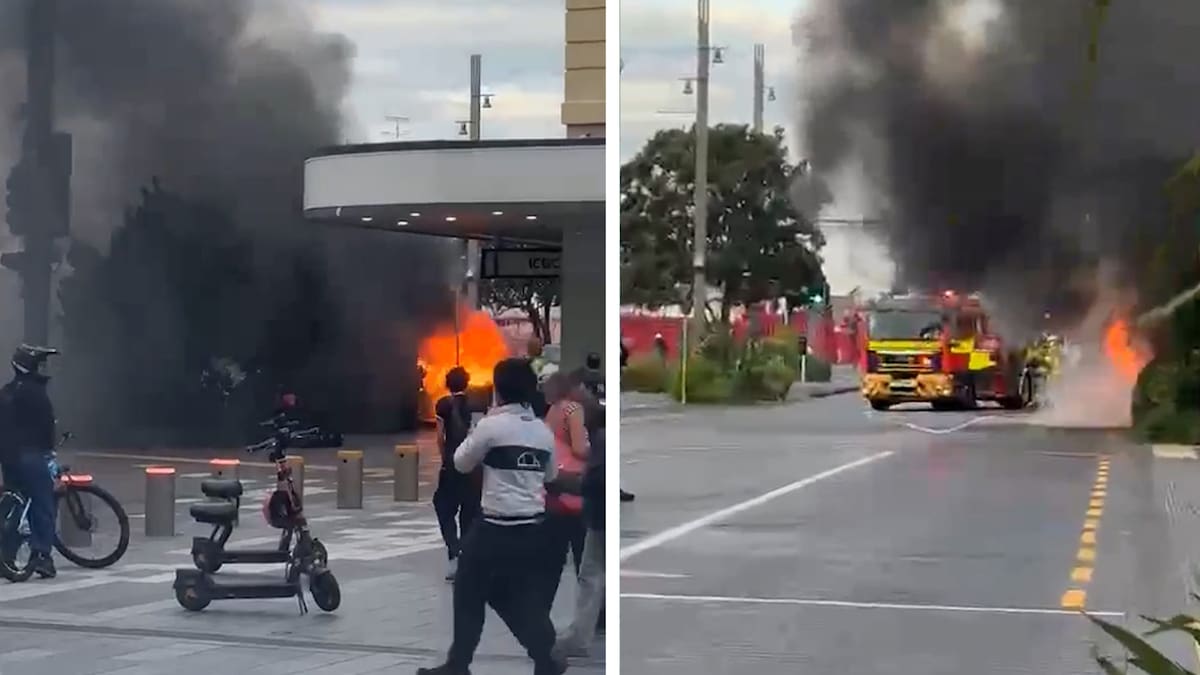 Watch: Car catches fire in downtown Auckland near busy train station