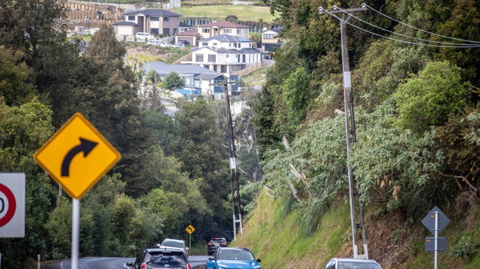 Kerbside parking could be banned on main roads, like Mill Rd pictured here, across Auckland. (Photo / File)