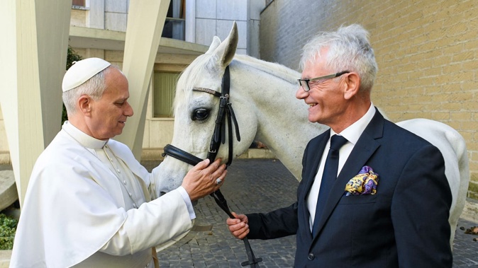 Pope Leo XIV received a 12-year-old Arabian horse, Proton, from Polish breeder Andrzej Michalski. Photo / Vatican Media, AFP