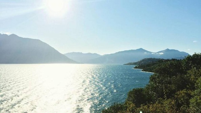 An inexperienced member of the fishing trip on Lake Wakatipu took over steering, grounded the boat then crashed into some rocks. All had to be rescued and some suffered injuries. Photo / Supplied, File