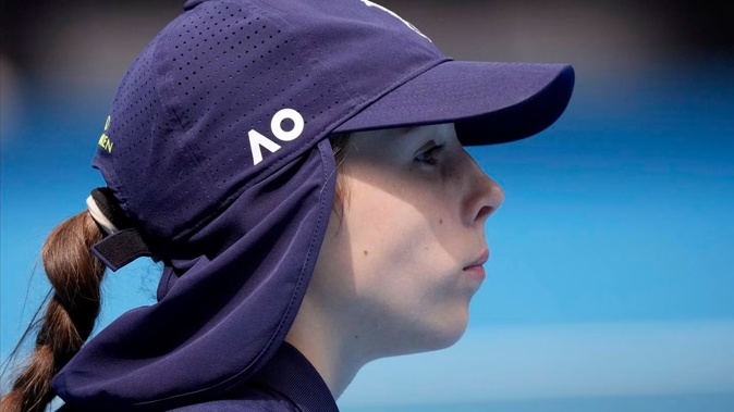 A ball kid watches play during the day of the Australian Open. Photo / AP