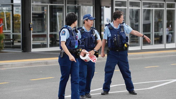 Police investigate a stabbing at the Albany Bus station. Photo / Dean Purcell
