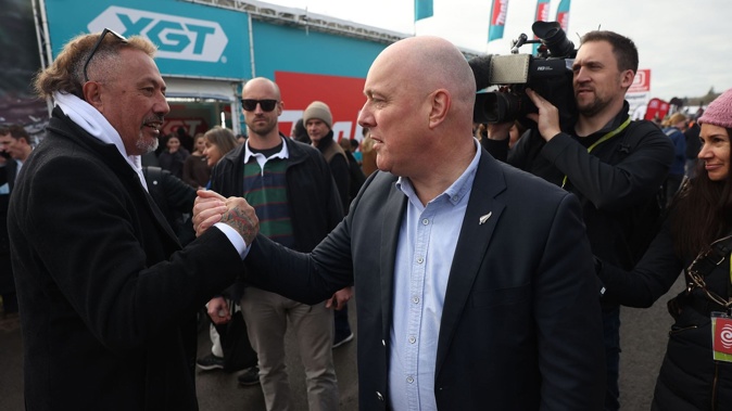 Mike King and Prime Minister Christopher Luxon meet at Field Day in Hamilton.