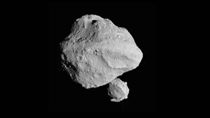 A photo taken by the Lucy spacecraft of asteroid Dinkinesh. Photo / AP
