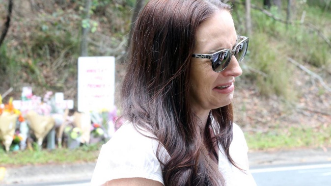A distraught Claudine Snow at the scene of the crash on New Year’s Day. Photo / Supplied