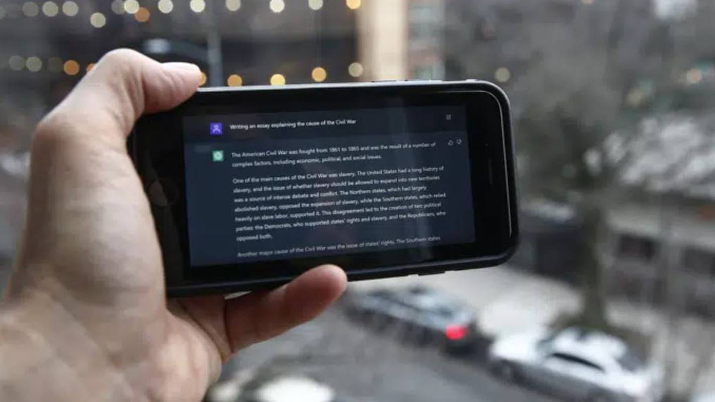 A ChatGPT prompt is shown on a device near a public school in Brooklyn, New York. Photo / AP