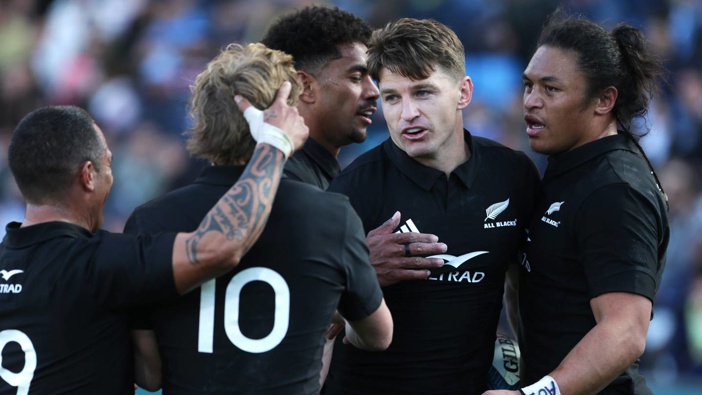 Beauden Barrett celebrates with teammates after scoring a try. Photo / Getty Images