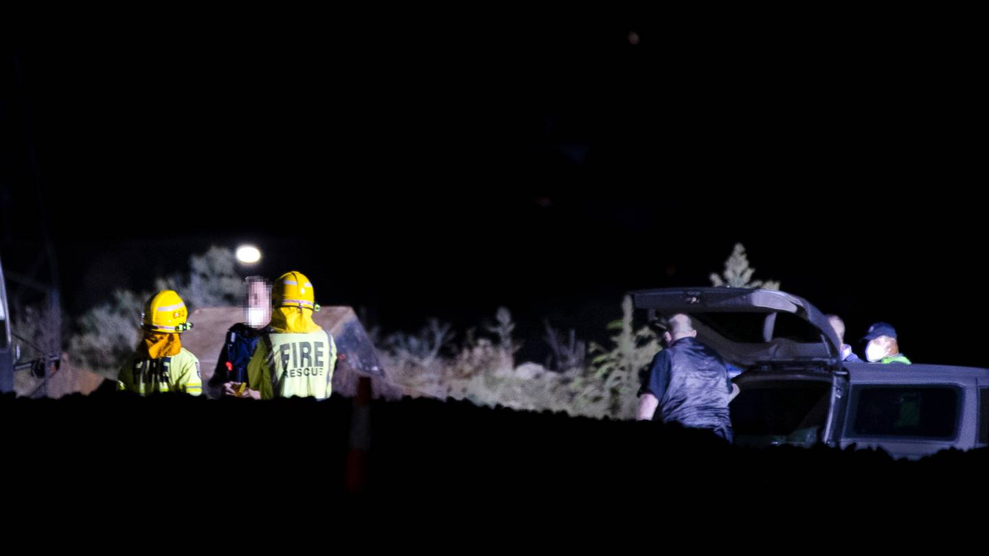 Emergency services at the scene of a sudden death on Selwood Rd in Henderson. Photo / Hayden Woodward