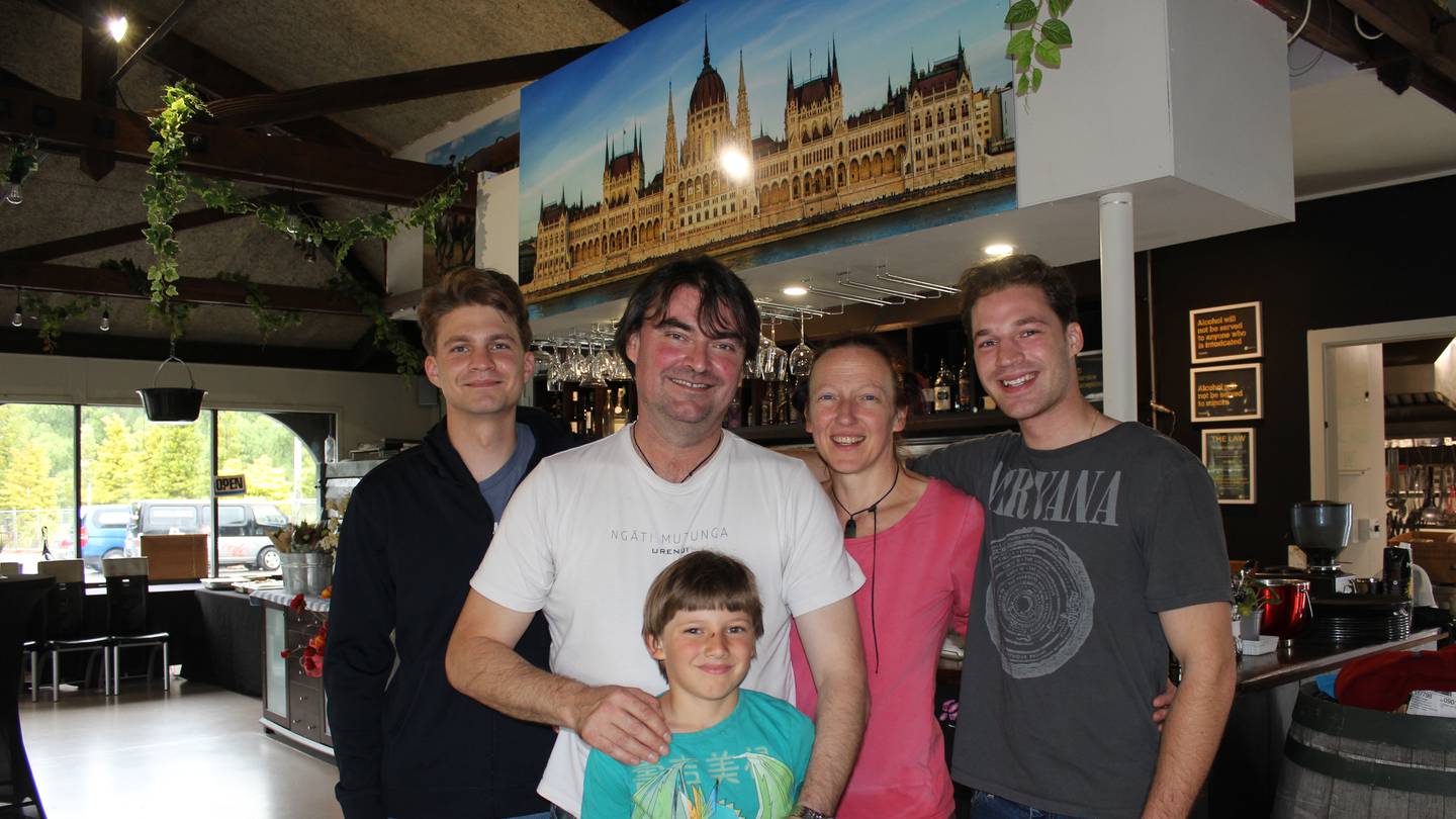 A delighted Andras Laslo and Ivett Kerekes with their sons Andor, left, Szilard, right, and Gergo, front. Photo/ NZ Herald