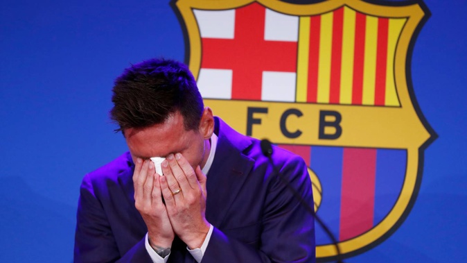 Lionel Messi cries at the start of a press conference at the Camp Nou stadium in Barcelona. (Photo / AP)