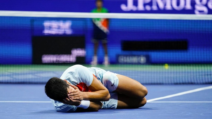 Carlos Alcaraz reacts after defeating Casper Ruud to win the men's singles final of the US Open. Photo / AP