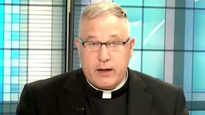 Monsignor Jeffrey Burrill is suing queer dating app Grindr.