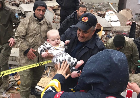 A baby is rescued from a destroyed building in Malatya, Turkey, following the earthquakes that affected Turkey and neighbouring Syria. Photo / AP