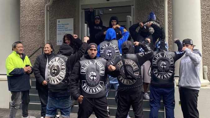 Black Power members from the Hāwera chapter gathered to support Hohepa Rio, Timothy Dixon and James Hansen, who are not pictured, at their sentencing in July. Photo / Tara Shaskey