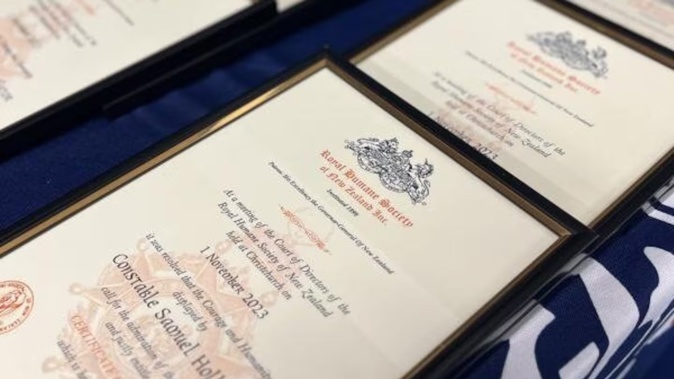 Police officers and members of the public received Certificates of Merit for their actions during the September 2021 attack on a New Lynn Countdown by Ahamed Samsudeen.