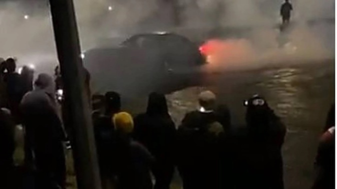 A boy racer meet in New Plymouth attracted hundreds of people last night. (Photo / Snapchat)