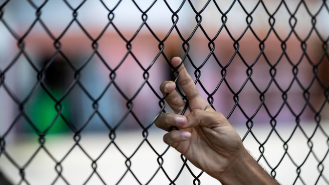 Australia has accepted an offer from New Zealand to resettle up to 150 refugees a year, including those held in its detention centres. (Photo / AP)