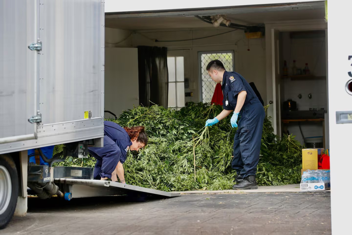One house police were seen at on Tuesday has a council valuation of $3.12 million. The other was valued at $2.52m. Photo / Dean Purcell