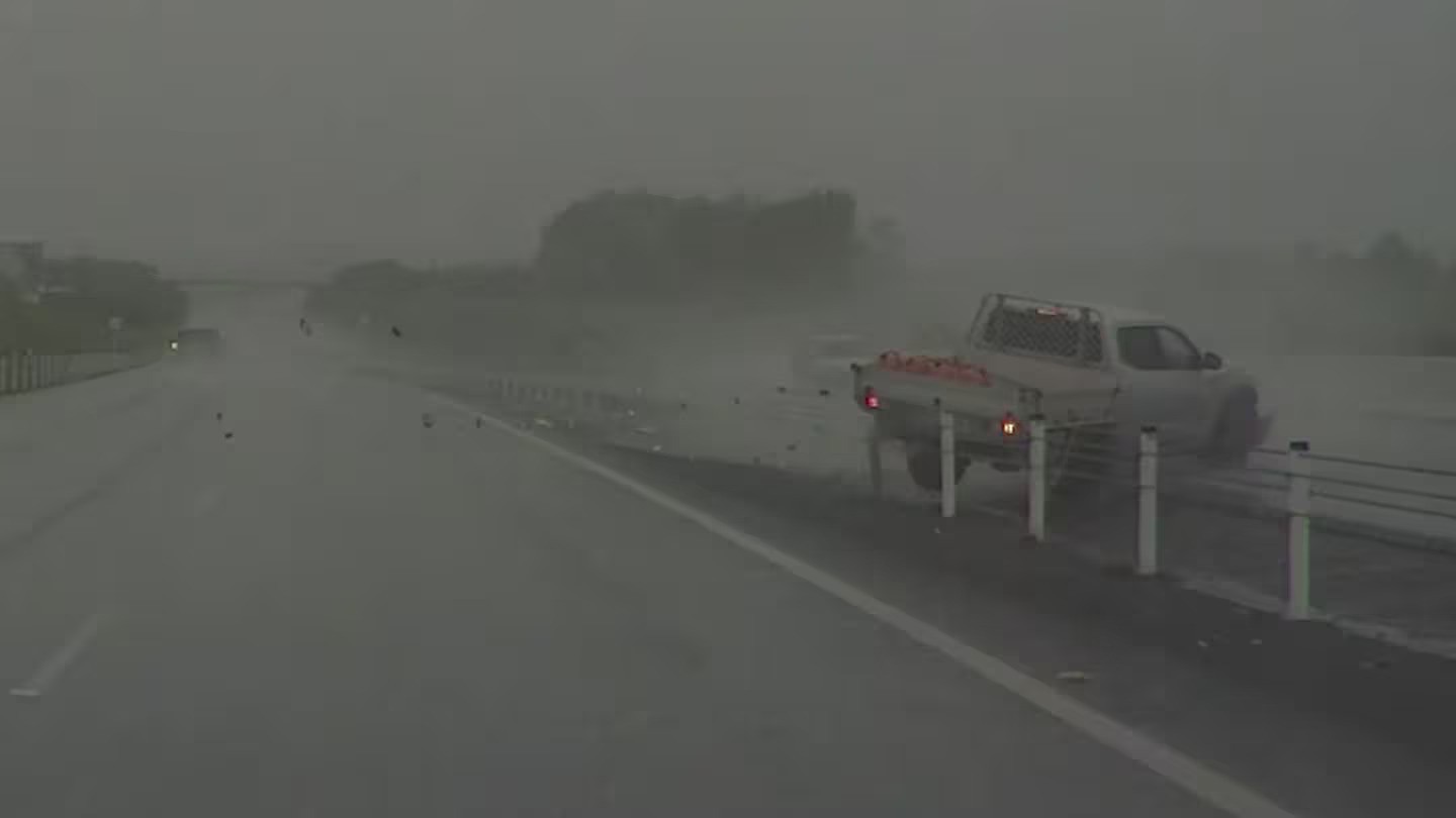 Watch: Dashcam captures crash in cyclone rainstorm, driver claims barrier stopped high-speed smash