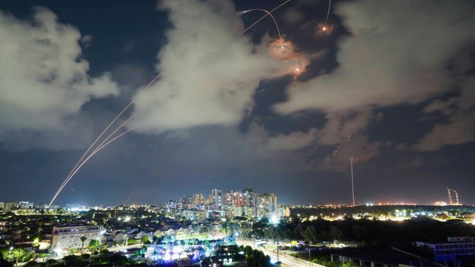 Israel's Iron Dome air defence system fires to intercept a rocket fired from the Gaza Strip, in Ashkelon, Israel. Photo / AP