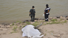 Thai rescuers cover a body on the shore of the Mekong River in Nakhon Phanom province northeast of Bangkok, Thailand, Thursday Dec. 27, 2018. (AP Photo, File)