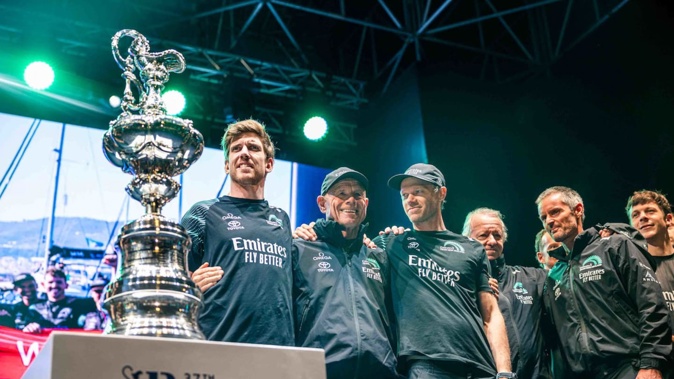 Nathan Outteridge (third from left) will replace Peter Burling (left) as skipper for Emirates Team New Zealand. Photo / Photosport