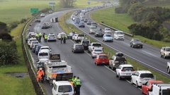 Police closed the Northern Motorway south of Silverdale after a two-car crash. Photo / Hayden Woodward