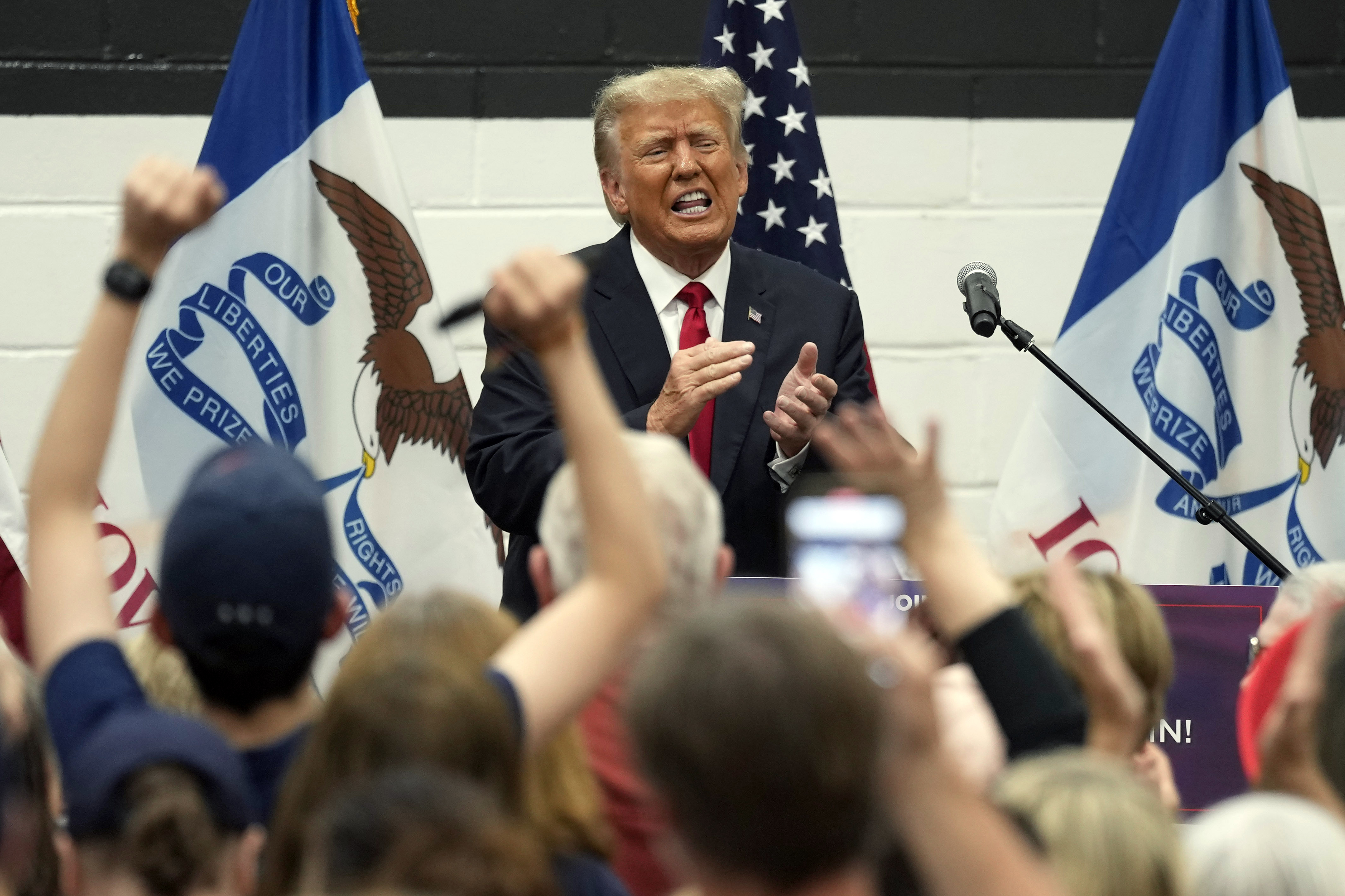 Former President Donald Trump reacts as he visits with campaign volunteers at the Grimes Community Complex Park, Thursday, June 1, 2023, in Des Moines, Iowa. Photo / AP