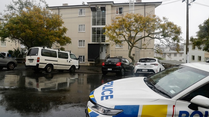 Police outside the Cracroft St, Parnell apartment where a woman died in "unexplained" circumstances overnight.