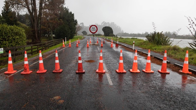Te Puna Station Road with a road closed sign in place. Photo / Alex Cairns