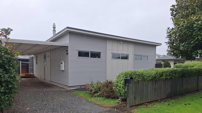 A Pāpāmoa Beach house was sold by mortgagee sale but after the previous owner refused to leave, the new owners went to the High Court to have her removed.