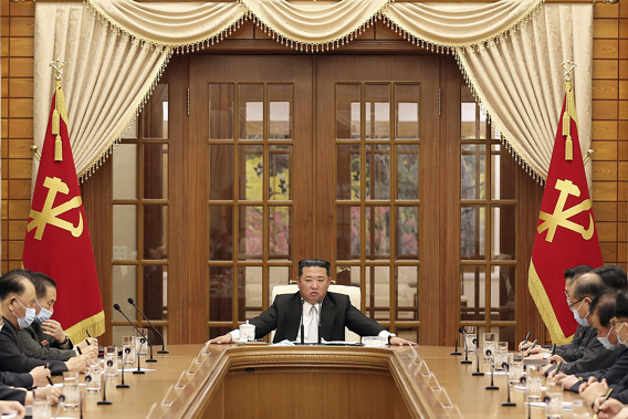 In this photo provided by the North Korean government, North Korean leader Kim Jong Un, center, attends a meeting of the Central Committee of the ruling Workers' Party in Pyongyang, North Korea Thursday, May 12, 2022. (Photo / AP)