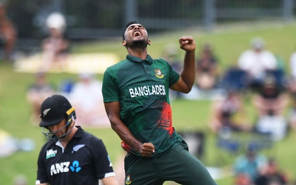 Bangladesh's Shoriful Islam celebrates the wicket of Black Caps opener Will Young. Photo / Chris Symes