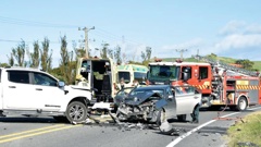 A pregnant woman suffered what were been described as 'critical' injuries this morning when the car she was a passenger in collided head-on with a ute on State Highway 35 at Wainui, near the Oneroa Road corner. Photo / Rebecca Grunwell