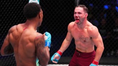 Aaron Tau (right) was beaten by unanimous decision by Elijah Smith on Dana White's Contender Series. Photo / Getty Images