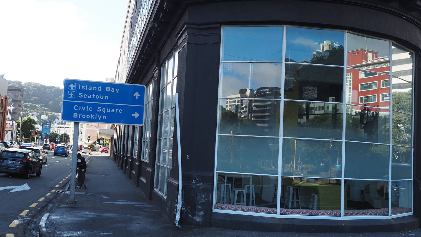 A car that failed to stop when signalled by police crashed into the building on the corner of Jervois Quay and Cable St in Wellington, killing two people and injuring three others. Photo / Nick James