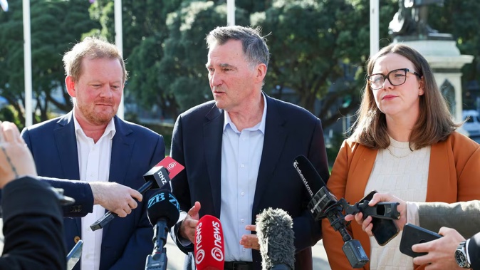 Council of Trade Unions president Richard Wagstaff (centre), economist Craig Renney and secretary Melissa Ansell-Bridges after their meeting with Workplace Relations Minister Brooke van Velden. Photo / Mark Mitchell