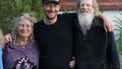 Joshua Terrey pictured with his mother, Lyn Hartnett, and father, Peter Terrey. The three people responsible for his 2019 kidnapping and assault have now all been dealt with by the court. Photo / Supplied family