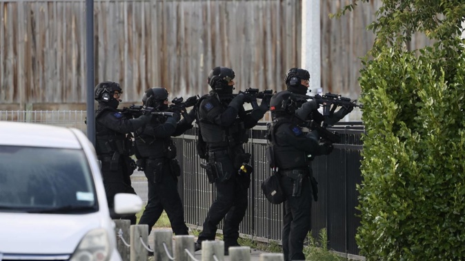 Police raid a property in Wigram in relation to a series of targeted shootings. Photo / George Heard