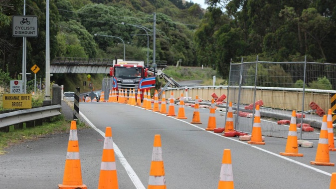 The Waikanae River bridge is restricted to northbound traffic only during construction of a clip-on shared path. Photo / David Haxton