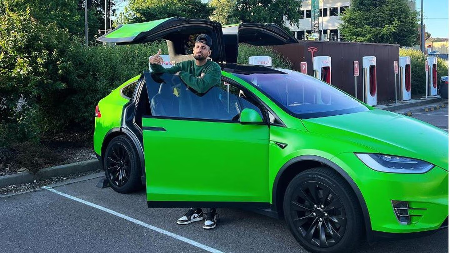 Australian tennis star Nick Kyrgios pictured on his Instagram account with a lime green Tesla. Photo / K1ngkyrg1os