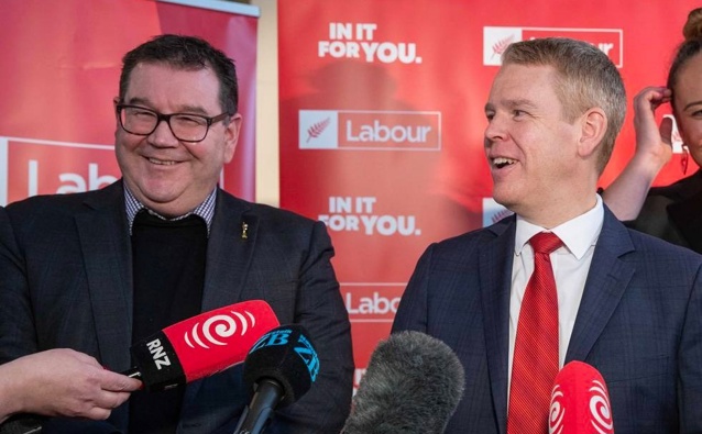 Chris Hipkins (centre), Grant Robertson and Carmel Sepuloni announce Labour’s cost of living package that removes GST from fruit and vegetables. Photo / Mark Mitchell